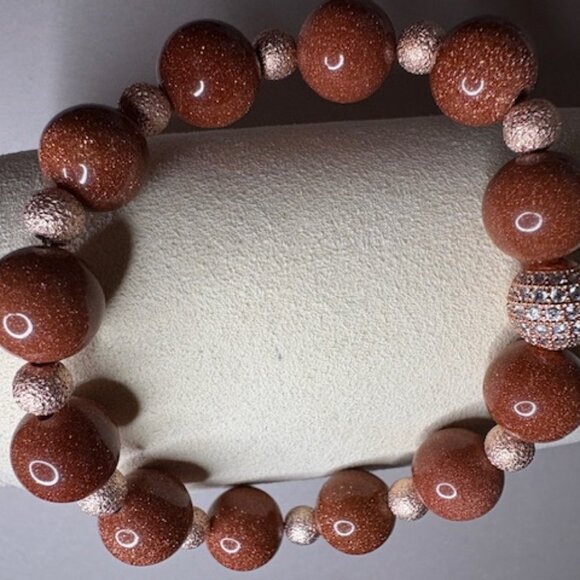 bracelet features large, polished goldstone beads - Picture 3 of 3
